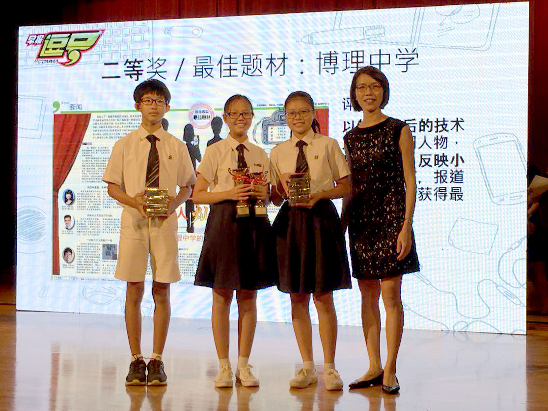 A group of 3 Students Posing with their Silver Award